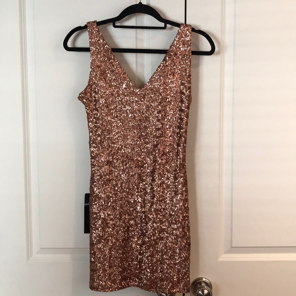 Bebe Addiction copper sequin lace up dress